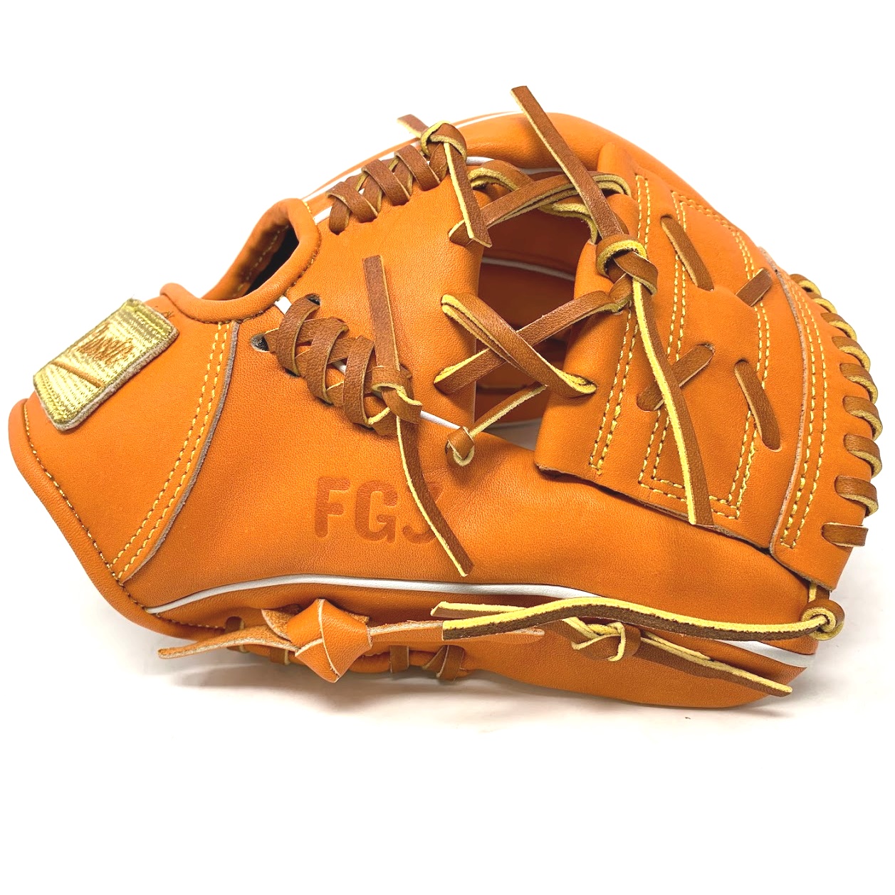 This classic small 11 inch baseball glove is made with orange stiff American Kip leather. Unique anchor laces add style and flare to the design. One piece web, open back, light weight, and stiff leather make this glove great for second base, small training glove, or just playing catch.    5 stars on the side of the glove representing the 5 tools of great baseball players.  Speed Power Hitting for power Fielding Arm strength 