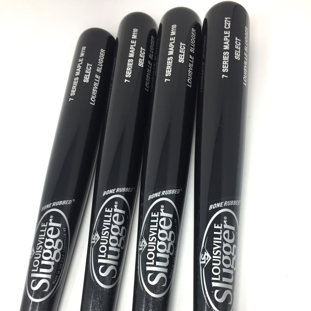34 Inch Series 7 Maple Wood Baseball Bats from Louisville Slugger. High Gloss Finish, Cupped, and no ink dot. 3 M110 and 1 C271. 4 bats in total.