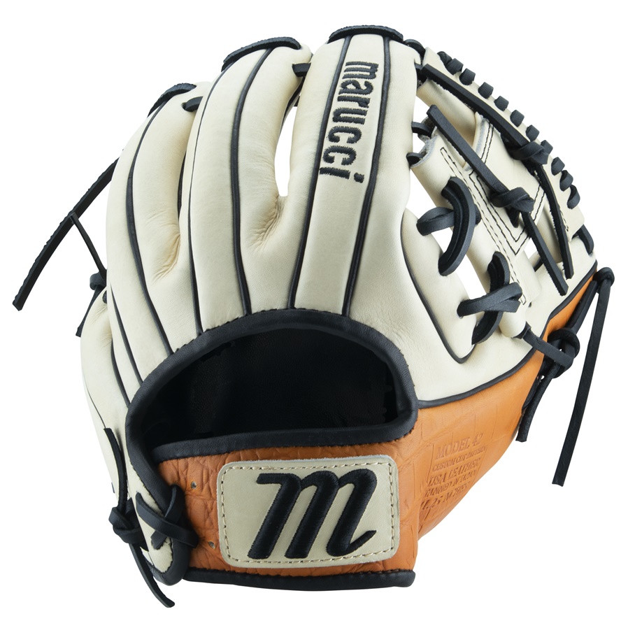 The Marucci Capitol line of baseball gloves is a top-of-the-line series designed to offer players the utmost comfort feel and durability on the field. One of the standout features of this line is the M Type fit system which integrates thumb and pinky sleeves with enhanced thumb stall cushioning providing a glove that maximizes both comfort and feel. When it comes to the materials used in these gloves Marucci has spared no expense in ensuring their quality. The back shell leather of the glove is made from Japan Kip a premium leather known for its strength and durability. This leather not only provides excellent structure but also contributes to the lightweight feel of the glove. Similarly the palm shell leather is also sourced from Japan Kip. By using this high-quality leather Marucci ensures that the glove maintains its ideal structure while remaining lightweight. This combination of structure and lightweight feel is essential for players who require both flexibility and responsiveness from their glove. The palm lining of the Capitol gloves is made from cabretta sheepskin the highest grade available. Cabretta sheepskin offers a luxurious texture that adds to the overall comfort of the glove. It also helps to enhance the grip and feel when catching and fielding the ball. The finger lining of the gloves is made from genuine leather which adds to the durability and longevity of the product. The use of genuine leather in this area ensures that the gloves can withstand the rigors of intense gameplay maintaining their shape and performance over time. The fit of the Capitol gloves is designed to be professional-grade. Marucci has paid meticulous attention to the design and construction of these gloves ensuring that they provide a snug and secure fit. This fit is crucial for players as it allows for maximum control and responsiveness when making plays on the field. In addition to the high-quality materials and exceptional fit the Capitol gloves also feature moisture-wicking mesh wrist lining. This lining helps to keep the player's hands cool and dry during long games or practices. The inclusion of dual density memory foam padding adds an extra layer of comfort and protection to the wrist area minimizing the impact of catching hard-hit balls. To further enhance the durability of the gloves Marucci has equipped the Capitol line with professional-grade rawhide laces. These laces offer maximum tear resistance ensuring that the glove maintains its shape and structure even after repeated use.