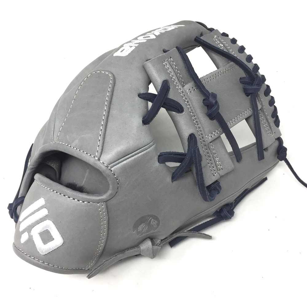 The American Kip series, made with the finest American steer hide, tanned to create a leather with similar characteristics to Japanese and European kip leather, making a light weight and highly structured glove. This series is offered in four modern colors - white, black, blonde, and gray - This glove is stiff and designed for 14 and under player with smaller hand opening.