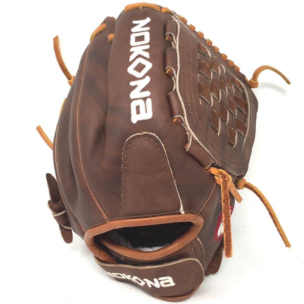 Inspired by Nokona’s history of handcrafting ball gloves in America for over 85 years, the proprietary Walnut Crunch™ leather is a Nokona signature. This glove provides great stability, durability, and a game-ready feel. The classic Walnut™ series has been updated to highlight the glove’s modern features, while also paying tribute to Nokona’s long-standing baseball and softball heritage.  Position: Infield/Outfield Adult 12 Pattern Closed-Web Velcro Back Walnut Crunch ~710g One Year Warranty Handcrafted with Pride in the USA 