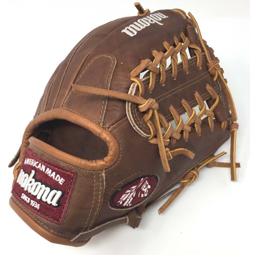 Made in USA     Nokona Walnut WB-1150M Baseball Glove 11.5 Modified Trap Right Handed Throw Walnut HHH Leather which provides greater stiffness and stability. 11.50 Inch Pattern with Modified Trap and Open Back. Leather Walnut Crunch Steerhide. Weight 675g. Average Break-In. Nokona has built its reputation on its legendary Walnut Leather. Now made with our proprietary Walnut HHH Leather™ which provides greater stiffness and stability. Once this glove is worked in, this glove is soft and supple, yet remains sturdy - a true, classic Nokona.