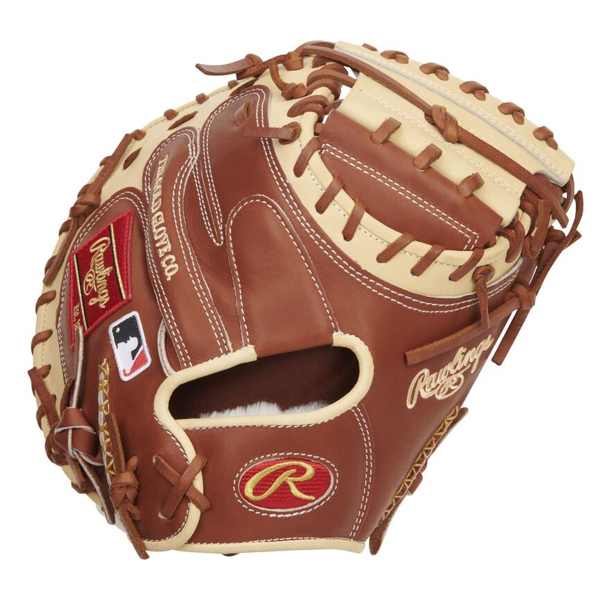 The Rawlings Pro Preferred® gloves are renowned for their exceptional craftsmanship and premium materials. These gloves are designed to offer a personalized fit and outstanding performance based on the player's specific preferences. One of the standout features of Pro Preferred® gloves is their clean and supple kip leather. This high-quality full-grain leather not only gives the gloves an unrivaled look but also provides a remarkable feel. As the gloves are used and broken in, they mold to the player's hand, creating a perfect pocket for optimal ball control. The Pro Preferred® series showcases professional game-day patterns that have been refined and perfected over time. These patterns are favored by top players in the game, offering a combination of functionality and style. Additionally, the gloves are constructed with pro-grade materials, ensuring durability and performance throughout multiple seasons. To enhance pocket formation and shape retention, Pro Preferred® gloves feature 100% wool padding. This padding helps the glove maintain its structure and ensures that the pocket remains consistent, allowing for precise catching and ball control. Comfort is a top priority in the design of Pro Preferred® gloves. The gloves are lined with Pittards® sheepskin palm lining, which serves two purposes. First, it wicks away moisture, keeping the player's hand dry and comfortable during intense gameplay. Second, it adds a layer of superior comfort, making the gloves feel luxurious and enjoyable to wear. Pro grade leather laces are utilized in the construction of these gloves to provide excellent durability and strength. These laces withstand the rigors of the game, ensuring that the gloves remain intact and reliable over time. Additional features of Pro Preferred® gloves include a padded thumb and pinky sleeve, which offer extra comfort during catches and throws. These padded sleeves reduce friction and pressure on these key areas of the hand, enhancing overall comfort and reducing the risk of injury. Lastly, each Rawlings Pro Preferred® glove comes with an individual identification number. This unique identifier adds a personal touch and allows players to easily distinguish their gloves from others. Rawlings Pro Preferred® gloves embody excellence in craftsmanship, performance, and comfort. They are the gloves of choice for professional players who demand the very best equipment to support their game season after season.