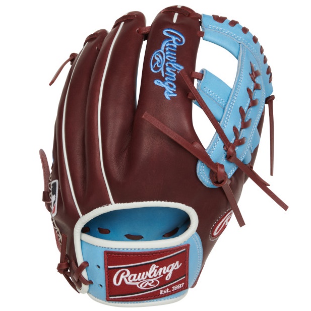 The Rawlings Gold Glove Club Baseball Glove of the month for March 2023 is the perfect pick for infielders looking to up their game. Featuring an 11 ¾” 200 pattern, this glove is specifically designed to offer optimal control and precision on the field. Crafted from Rawlings’ legendary Heart of the Hide® leather, the PRO205-19CBSH model is built to last, with unparalleled durability and comfort. The X-laced single post web provides added flexibility, making it easier for infielders to field and throw the ball with speed and accuracy. But it’s not just the glove’s exceptional performance that sets it apart. The PRO205-19CBSH is also a stunning piece of equipment, featuring a unique sherry and Columbia blue color combination that is sure to turn heads. The sherry colored Rawlings embroidered patch logo adds the perfect finishing touch, making this glove a true work of art.  The Rawlings Gold Glove Club Baseball Glove of the month for March 2023 is a must-have for serious infielders looking to elevate their game to the next level. Whether you’re a seasoned pro or just starting out, this glove is sure to impress with its unbeatable combination of style and performance. Don't miss your chance to own this one-of-a-kind glove!    11.75 Inch X-Laced Single Post Web Sheery Colored Rawlings Patch Hand Sewn Welting 