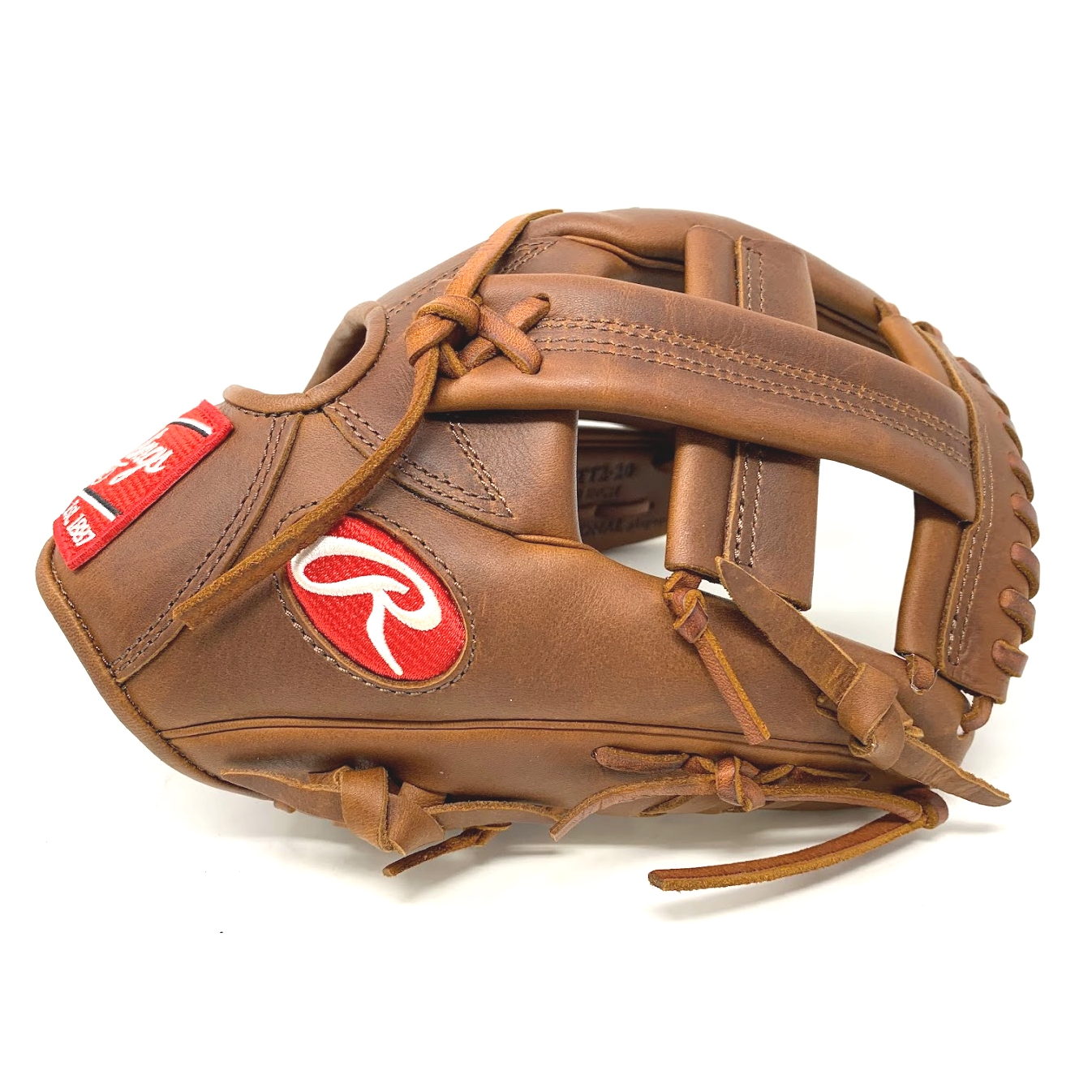 Improve your game with the Rawlings Heart of the Hide TT2 11.5 Inch infield glove from ballgloves.com and Don Morton Sports. Show off your unique style with this high-quality glove crafted from ultra-premium steer-hide leather and featuring the popular TT2 pattern. The wide, shallow pocket design allows for quick and easy transfers.   Pattern: TT2Sport: BaseballLeather: Heart of the HideFit: StandardThrowing Hand: Right-Hand ThrowPosition: InfieldSize: 11 1/2Web: Single PostColor: TimberglazeLogo: PatchLaces: TimberglazeNo Palm PadWrist Lining: Thermo FormedBreak-In: Standard