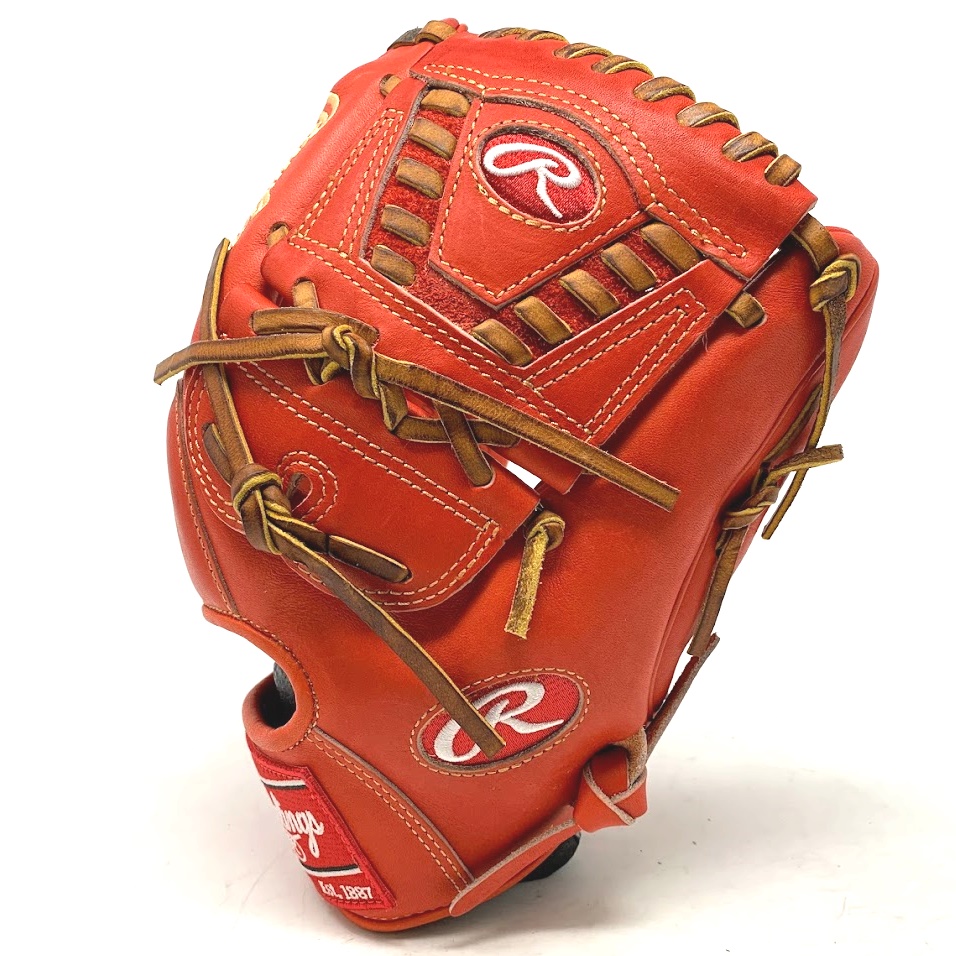 The Rawlings PRO205-30RODM baseball glove is 11.75 inches in size and has a unique Heart of the Hide red orange leather and 2-piece solid web design, making it suitable for both infielders and pitchers.  11.75 Inch 200 Pattern 30 Web Two Piece Closed Tan Laces Thermo Wrist Lining Padded Thumb Red/Orange Lining Rolled Welt Index Finger Pad Rawlings Heart of Hide exclusive Red/Orange Leather 