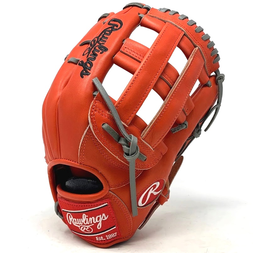 Ballgloves.com Exclusive in Rawlings Heart of the Hide Red-Orange leather. 42 pattern, 12.75 inch, grey lace. The 442 pattern from Rawlings is a unique and non-traditional outfield glove. The glove has a wide pocket and slightly shallower pocket depth than the Rawlings 303 pattern, giving players a little more feel of each ball. The glove also features double heel lace run like the TT2, and lace through on the fingers of the glove.   The Rawlings 442 pattern baseball glove is a non-traditional outfield pattern that has gained popularity, particularly due to its association with MLB player Cody Bellinger. Bellinger has been using the PRO442 pattern glove since 2019, and it has become an iconic part of his playing style.   Crafted from ultra-premium steer-hide leather, the Heart of the Hide outfield glove offers unmatched quality and feel. The 12.75-inch 442 pattern is specifically designed to help players like Bellinger make even the most difficult plays look routine in the outfield. The wide pocket provided by this unique pattern allows for exceptional ball control and ensures that the glove closes flat, increasing the chances of successful catches.   One notable feature of the 442 pattern is its slightly shallower pocket depth compared to the popular Rawlings 303-pattern. This feature gives outfielders like Bellinger a heightened sense of each ball they encounter, enabling them to react swiftly and make accurate throws. The glove's design is optimized for tracking down fly balls with confidence, allowing players to cover more ground and secure outs effectively.   By choosing the Rawlings 442 pattern glove as your next gamer, you'll be joining an exclusive group of players who value exceptional performance and reliability. Known as The Finest in the Field, these gloves are trusted by professional athletes and amateur players alike. Whether you're making the toughest plays or confidently tracking down fly balls, the Rawlings 442 pattern glove will help elevate your game and establish you as a force to be reckoned with on the field.           