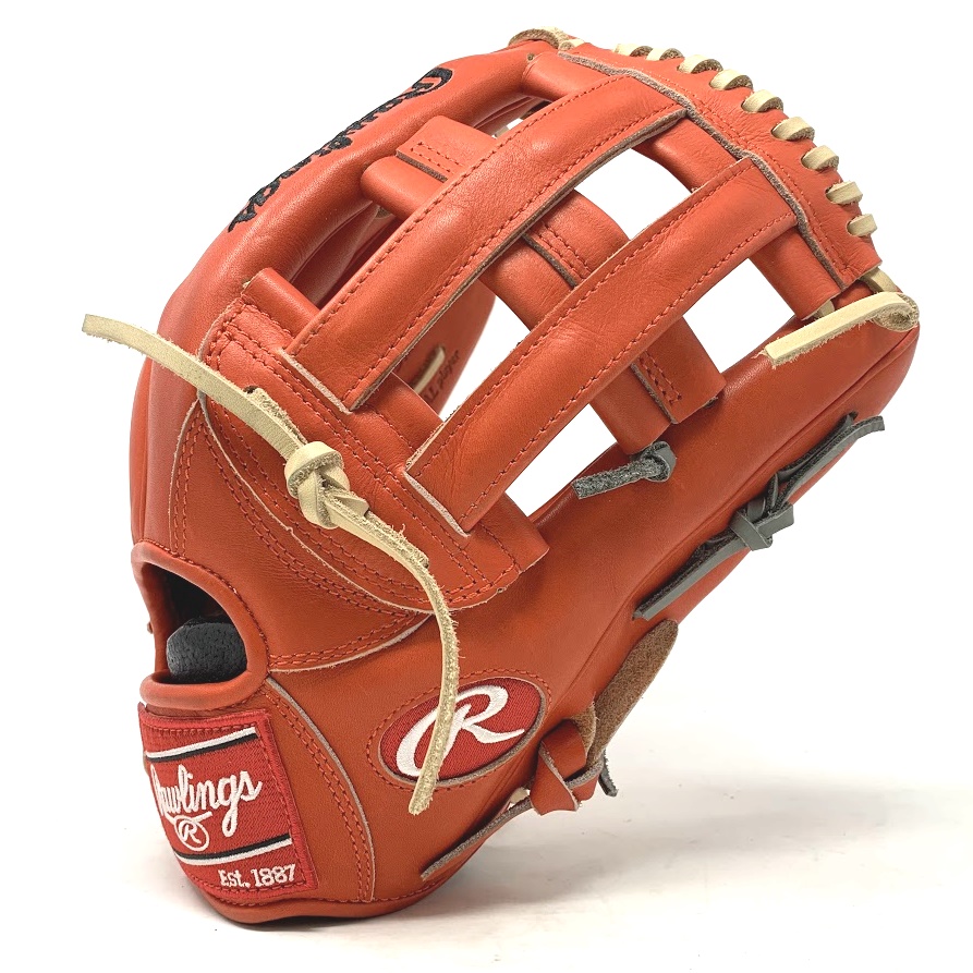 Ballgloves.com Exclusive in Rawlings Heart of the Hide Red-Orange leather. 42 pattern, 12.75 inch, camel lace. The 442 pattern from Rawlings is a unique and non-traditional outfield glove. The glove has a wide pocket and slightly shallower pocket depth than the Rawlings 303 pattern, giving players a little more feel of each ball. The glove also features double heel lace run like the TT2, and lace through on the fingers of the glove.