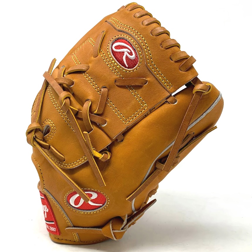 Rawlings PRO1000-9HT in Horween Leather with vegas gold stitch. The Rawlings 12.25-inch Horween Leather two-piece closed web is a top-of-the-line choice for pitchers looking for a premium baseball glove. This glove is constructed using exclusive Horween leather, known for its durability, suppleness, and timeless aesthetic. Horween leather is a premium leather that is produced in Chicago, Illinois, which is tanned using traditional methods to produce some of the finest leathers in the world. This leather gives the glove a soft, comfortable feel and a great look. The two-piece closed web design provides a deep pocket for the pitcher to secure the ball easily and a closed web for added concealment to the pitcher's grip. Although some pitchers prefer a smaller 11.75 inch glove, some say this 12.25-inch size is the perfect size for a pitcher's glove, allowing for a comfortable fit and great control. The Rawlings Horween Leather two-piece closed web is perfect for pitchers of all levels looking for a top-quality glove that will help them perform at their best. It is a perfect blend of quality, durability, and style.  12.25 Inch Two Piece Closed Web Horween Leather 