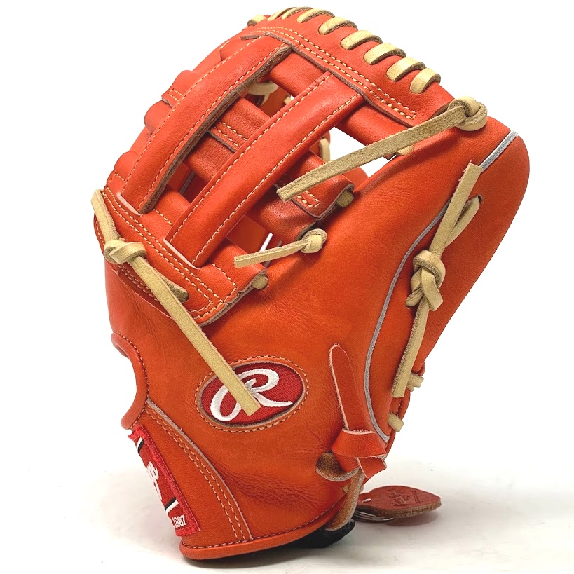 Rawlings popular 200 infield pattern Heart of the Hide in red/orange color.   The 200-pattern baseball glove pattern by Rawlings is highly favored by professional infielders in today's game due to its exceptional adaptability and the deep pocket it offers, making it one of the most sought-after patterns in the field.    11.5 Inch H Web Grey Split Welt Padded Thumb Thermoformed Wrist Camel Lace                   