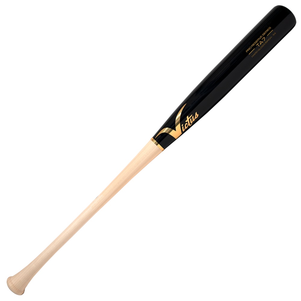 Introducing the Victus Birch Wood Bat: Rip it and Flip it with Tim Anderson’s TA7. This baseball bat is designed to deliver power and control to handsy hitters who want to make a big impact on the field. With its impressive features and high-quality construction, the TA7 is a top choice for players looking to enhance their performance. The TA7 is an end-loaded bat, meaning it has additional weight towards the barrel. This design provides increased whip through the hitting zone, allowing hitters to generate more power and drive the ball with authority. Whether you're looking to rip line drives or flip the ball over the outfield, this bat is built to deliver the results you need. One standout feature of the TA7 is its flared knob. The flared design offers a comfortable grip and helps prevent slippage during the swing. This ensures that your hands stay secure on the bat, allowing you to maintain control and make precise contact with the ball. The handle of the TA7 measures .95 inches in diameter, providing a balanced feel and allowing for quick wrist action. This thin handle enables players to generate bat speed and make explosive swings, giving them an edge at the plate. The barrel of the TA7 is large, measuring 2.52 inches in diameter. This sizeable barrel offers a larger sweet spot, increasing the chances of solid contact and improving the likelihood of driving the ball with power. The gloss black/natural colorway of the bat, combined with gold chrome detailing, gives it a sleek and professional appearance that stands out on the field. The Victus Birch Wood Bat is constructed using high-quality birch wood. Birch is known for its durability, strength, and flexibility, making it an excellent choice for baseball bats. It provides a solid feel upon contact and offers a great combination of power and control. To provide additional peace of mind, the Victus Birch Wood Bat comes with a 45-day warranty from Victus. This warranty ensures that you can confidently use the bat without worrying about defects or issues. In conclusion, the Victus Birch Wood Bat: Rip it and Flip it with Tim Anderson’s TA7 is a top-tier baseball bat designed for handsy hitters who want to maximize their performance on the field. With its end-loaded design, flared knob, thin handle, large barrel, and durable birch wood construction, this bat delivers power, control, and style. Whether you're a seasoned player or just starting your baseball journey, the TA7 is a reliable choice that can help you take your game to the next level.  Knob: Flared Handle: .95” Barrel: Large 2.52” Feel: End-Loaded Wood: Birch 45 day warranty included 