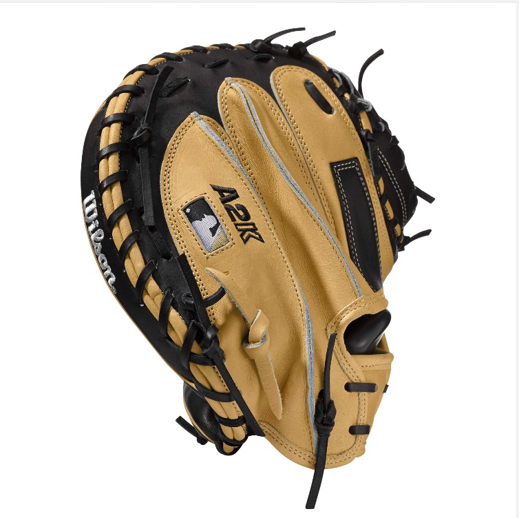 A2K M1 - 33.5 Wilson A2K M1 Catchers Baseball GloveA2K M1 32.5 Catchers Baseball Glove - Right Hand ThrowWTA2KRB17M1 The M1 makes its first appearance in the A2K series this year, as a larger catcher's mitt than previous years' A2K catcher's mitt models. The blonde and black mitt comes with a 12 Moon Web, as well as Dual Welting for a durable pocket and Dri-Lex Wrist Lining to keep your hand cool and dry during long days behind the dish.The finest cuts of leather. Meticulous construction. Three times more hand shaping by Wilson master technicians. All off these qualities make the A2K our premier glove. The one players turn to when they want a long-lasting glove that breaks in without breaking down. Made from the top 5% of Pro Stock Select leather, each hide is chosen for consistency and flawlessness, so the A2K baseball glove is the most premier glove available. 33.5 Catcher's Model Half Moon Web Pro Stock Select Leather for a long lasting glove and great break-in Dual Welting for a durable pocket Dri-Lex Wrist Lining to keep your hand cool and dry CatcherRHT 33.5 12 Moon WebPro Stock Select LeatherA2000 Pudge A2K 2800 Wilson A2000 T-Shirt A2000 Glove Care Kit Aso-San Glove Mallet Aso Breaks in a Catcher's Mitt