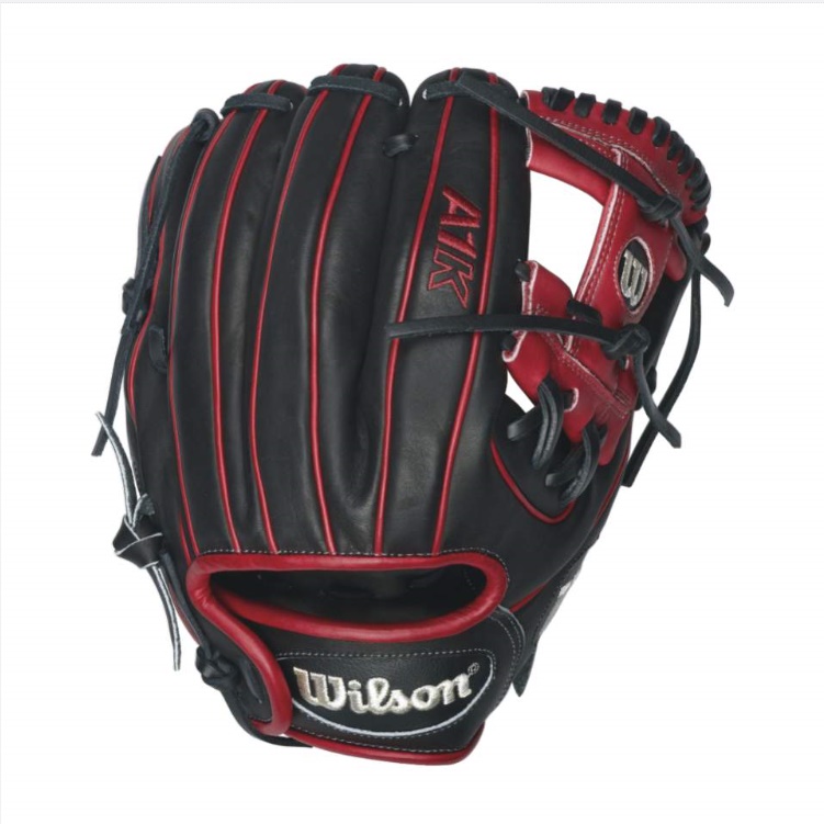 A1K DP15 Red Accents - 11.5 Wilson A1K DP15 Red Accents Infield Baseball Glove A1K DP15 11.5 Infield Baseball Glove - Right Hand Throw WTA1KRB16DP15RThis A1K DP15 has red accents and is built using Dustin Pedroia's game model glove specifications. He prefers a snug fitting baseball glove that allows him to quickly find the ball and make the play. It is perfect for middle infielders looking for more feel. Built for players who prefer a tighter fitting glove with pro-level performance, the A1K glove series features Pro Stock patterns with a Pedroia Fit. When Dustin Pedroia needed a glove that fit differently that the A2K and A2000, we designed the Pedroia Fit for him. It has a smaller hand opening, shorter finger stalls and a low profile heel pad that provides optimal feel, and it's available for players in every position with the A1K. 11.5 Infield ModelH-WebFastbreak Construction combines the expertise of Wilson A2000 technicians with materials optimized for a quicker break inPedroia Fit - All of the fit modifications Dustin Pedroia requests-including a snug fit, long laces, smaller hand opening and low profile heelLow profile heel for less rebound on bad-hop grounders and to make the glove easier to closeTop Shelf Leather for durability and a custom break inRolled Dual-Welting for quicker break inPro Stock Patterns - The same base patterns used on the legendary Wilson A2K and A2000 models InfieldRHT 11.5 h-web Top Shelf Leather A2K DP15 GM A1K OTIF Wilson A2000 T-Shirt Wilson Glove Care KitAso-San Glove Mallet Aso breaks in Brandon Phillips Glove