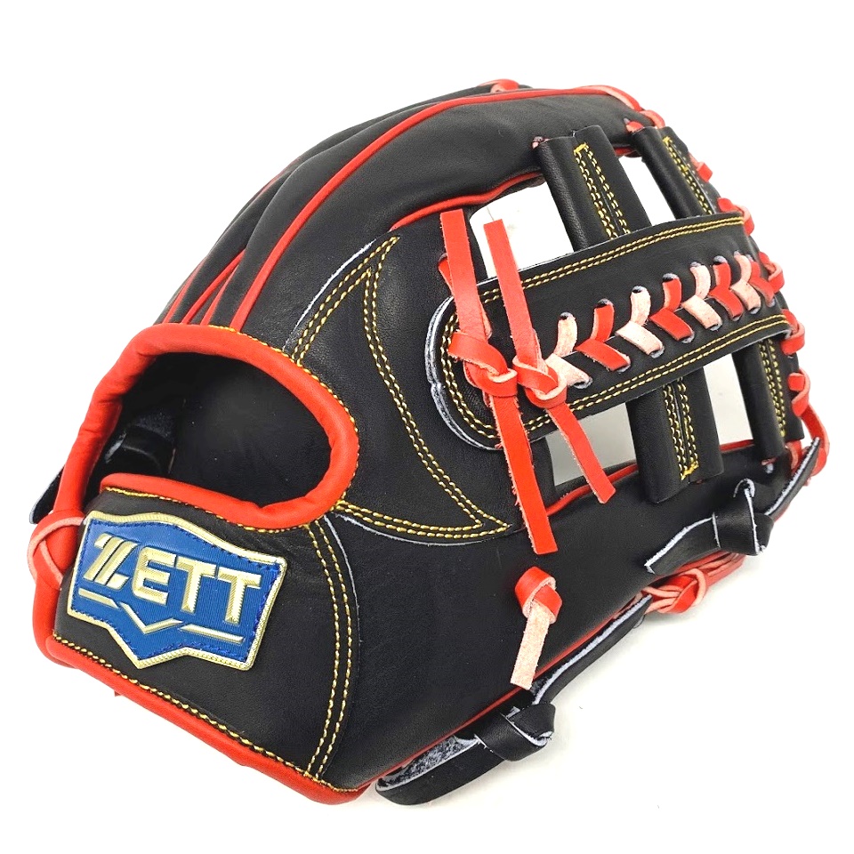   ZETT Pro Model 12 inch Black/Red Wide Pocket Infielder Glove ZETT Pro Model Baseball Glove Series is designed for use by professional players. These gloves are made light, retaining stable tactility while holding the ball. This design helps players catch and throw in less time. The gloves are made with US steerhide, making them suitable for use in advanced competitive games. About US Steerhide The raw material comes from the North American cattle which is about 18-month old. US Steerhide has been produced and tanned by Taiwanese professional leather factories whose baseball gloves tend to be thicker and more durable.US Steerhide has currently become one of the most widely adopted high-class leather on the market. Wide-Pocket The molded design adds a strip of leather between the index and middle fingers that widens the ball-catching surface of the glove. This also moves the contact point of the ball from the webbing between the thumb and forefinger to the palm of the hand. This shallower contact point allows faster catches and throws, increases the chance of catching runners stealing bases, and deters would-be runners.Thumb/Pinky Reinforcement The thumb/pinky stripes will be extended to fingertips, which will strengthen the structure and have good control of the glove.More InformationSize Measurement: from wrist to index fingertip (outside)